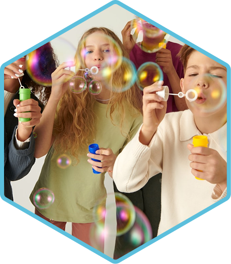 Children playing with bubbles