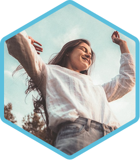 Young woman dancing outdoors