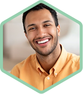 Man smiling directly at the camera