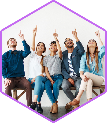 Group of people sitting on a bench pointing upwards